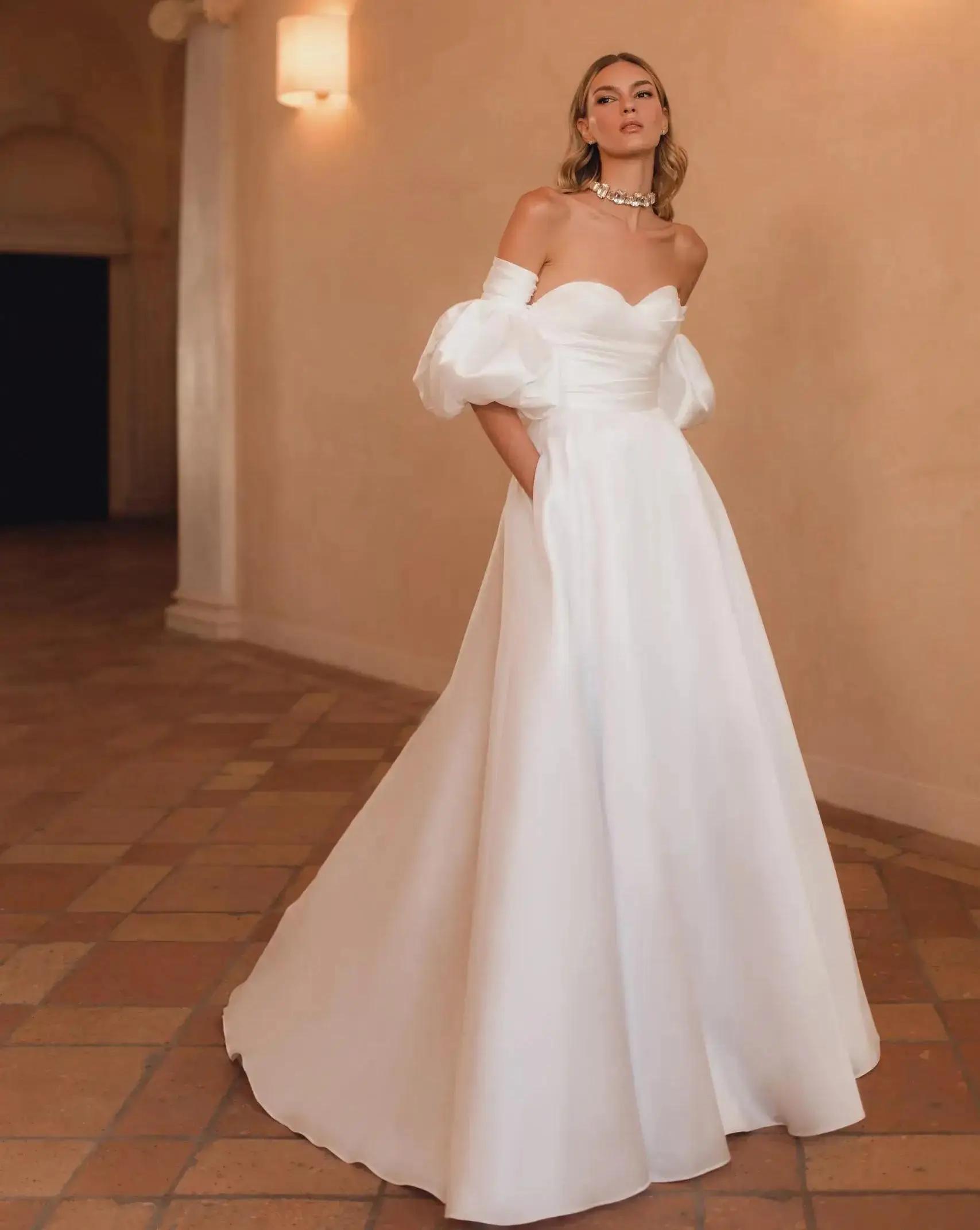 Exploring Trends in 2024 Wedding Gowns Image