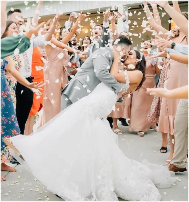 Photo of the kissing real bride and groom